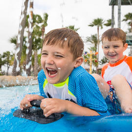 Palm Beach image of two kids on the lazy river